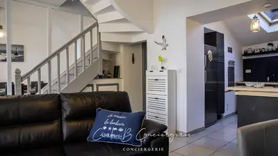 Coin salon dans l'établissement MAISON LE BONHEUR Concarneau 4 personnes