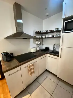 Cuisine ou kitchenette dans l'établissement Le Traverse élégant T2 au cœur du centre ville