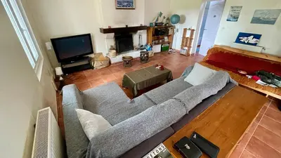 Télévision ou salle de divertissement dans l'établissement Maison familiale Ty Breizh Nevez
