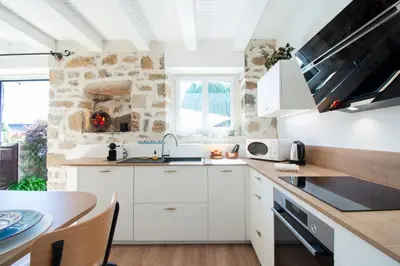 Cuisine ou kitchenette dans l'établissement Nid de Granit I Plage & Terrasse