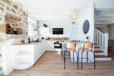 Cuisine ou kitchenette dans l'établissement Nid de Granit I Plage & Terrasse