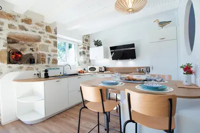 Cuisine ou kitchenette dans l'établissement Nid de Granit I Plage & Terrasse
