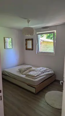 Un ou plusieurs lits dans un hébergement de l'établissement Wooden house