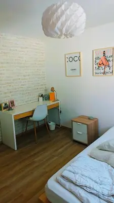 Un ou plusieurs lits dans un hébergement de l'établissement Wooden house