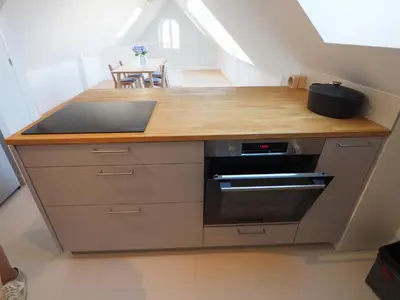 Cuisine ou kitchenette dans l'établissement Maison Le Rose