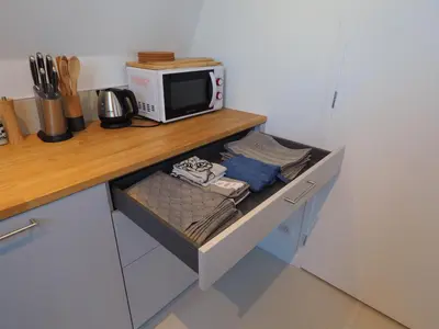 Cuisine ou kitchenette dans l'établissement Maison Le Rose