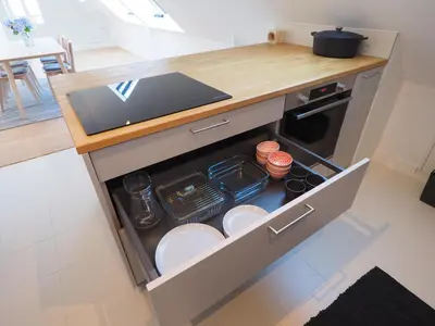 Cuisine ou kitchenette dans l'établissement Maison Le Rose