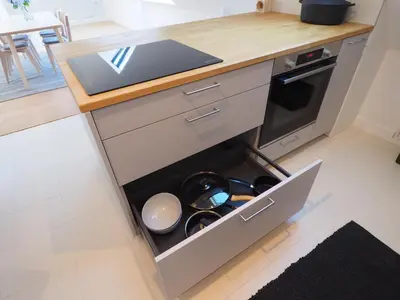 Cuisine ou kitchenette dans l'établissement Maison Le Rose