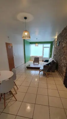 Coin salon dans l'établissement Appartement 58m2 10min de la gare à pied