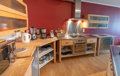 Cuisine ou kitchenette dans l'établissement Vaste loft face à la plage, vue mer