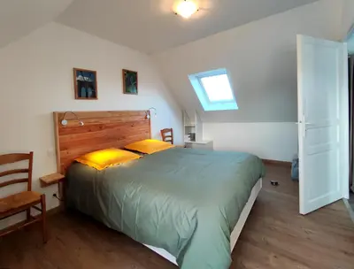 Un ou plusieurs lits dans un hébergement de l'établissement Location bretagne Plougasnou LocPalais