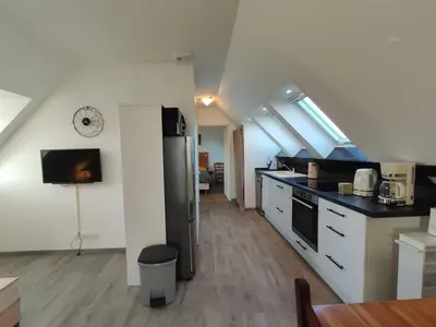 Cuisine ou kitchenette dans l'établissement Location bretagne Plougasnou LocPalais