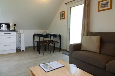 Cuisine ou kitchenette dans l'établissement Location bretagne Plougasnou LocPalais