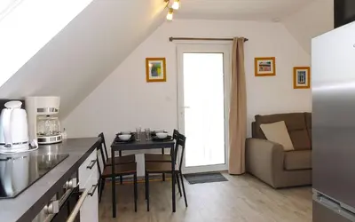 Cuisine ou kitchenette dans l'établissement Location bretagne Plougasnou LocPalais
