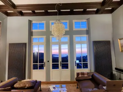 Coin salon dans l'établissement Bellevue - Boutique B&B