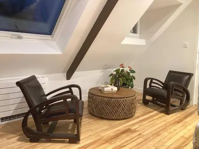 Coin salon dans l'établissement Kervéo vue sur mer - Gîte, spa et sauna