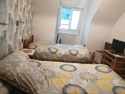 Un ou plusieurs lits dans un hébergement de l'établissement Colette chambre chez l'habitant