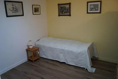 Un ou plusieurs lits dans un hébergement de l'établissement Appartement vue exceptionnelle mer - 3 chambres