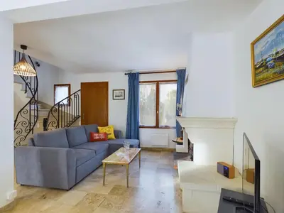 Coin salon dans l'établissement Maison idéale pour familles - Grand jardin