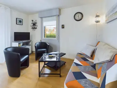 Télévision ou salle de divertissement dans l'établissement Concarneau, appartement pour 4 personnes