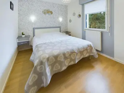 Un ou plusieurs lits dans un hébergement de l'établissement Concarneau, appartement pour 4 personnes