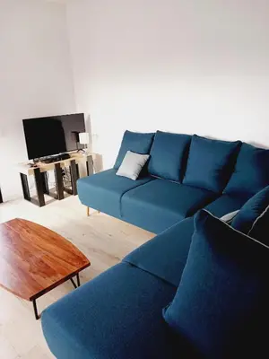 Coin salon dans l'établissement Jolie maison contemporaine proche plage