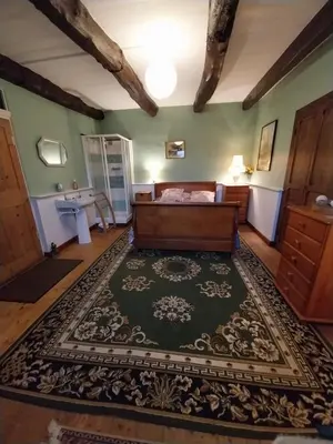 Un ou plusieurs lits dans un hébergement de l'établissement Rest Huella Farmhouse