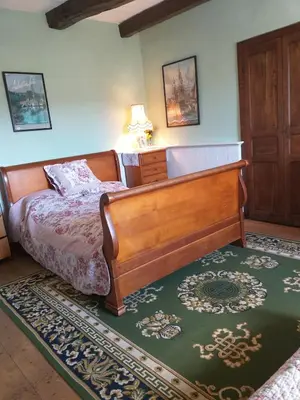 Un ou plusieurs lits dans un hébergement de l'établissement Rest Huella Farmhouse