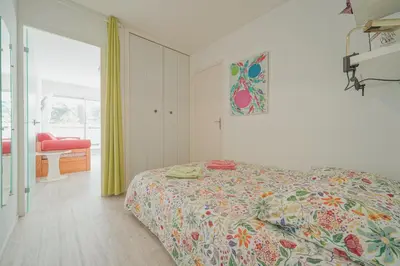 Un ou plusieurs lits dans un hébergement de l'établissement Appartement balcon vue mer, séjour bord de plage en couple