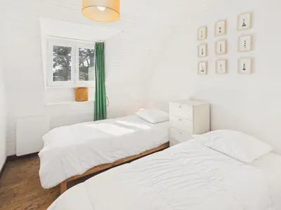 Un ou plusieurs lits dans un hébergement de l'établissement 50 m de la plage - Maison pour 6 avec jardin