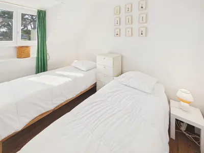 Un ou plusieurs lits dans un hébergement de l'établissement 50 m de la plage - Maison pour 6 avec jardin