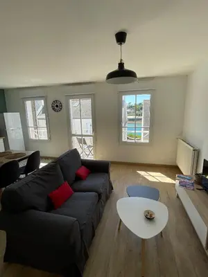 Coin salon dans l'établissement Appartement lumineux vue mer
