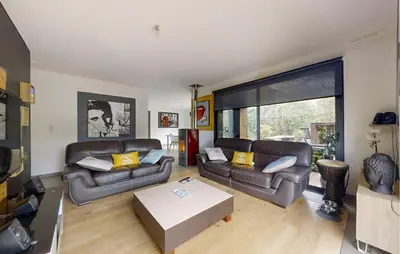 Coin salon dans l'établissement 3 Bedroom Lovely Home In Fouesnant