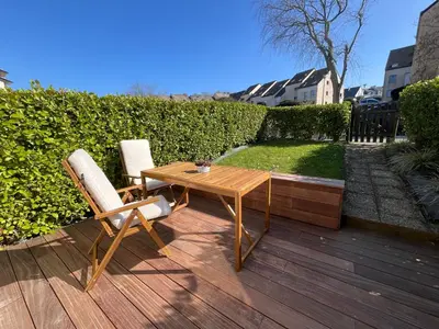 Jardin de l'établissement Perle des Sables Blancs, appartement entier à 100m de la plage avec parking privé