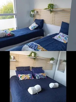 Un ou plusieurs lits dans un hébergement de l'établissement TY SAM Beau T2, terrasse vue mer
