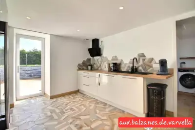 Cuisine ou kitchenette dans l'établissement Charming cottage with boulodrome near Brest
