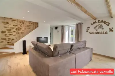 Coin salon dans l'établissement Charming cottage with boulodrome near Brest