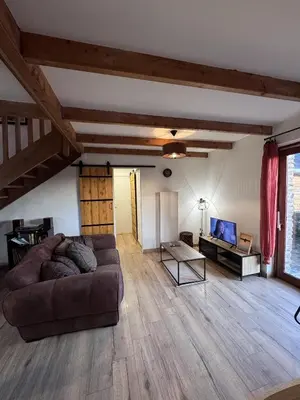 Télévision ou salle de divertissement dans l'établissement Gîte Paisible à la Campagne pour 5 Personnes