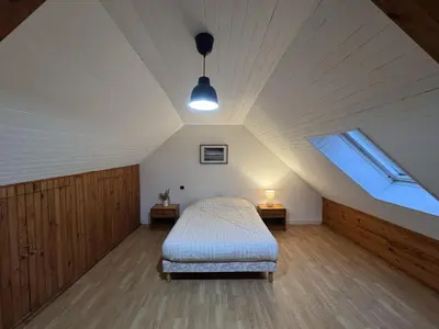 Un ou plusieurs lits dans un hébergement de l'établissement Gîte Paisible à la Campagne pour 5 Personnes