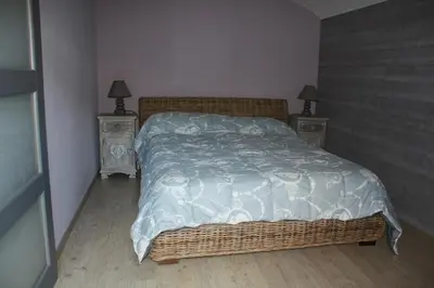 Un ou plusieurs lits dans un hébergement de l'établissement Maison de la plage avec Piscine - Breizh Location