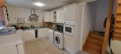 Cuisine ou kitchenette dans l'établissement Green Acres Bretagne