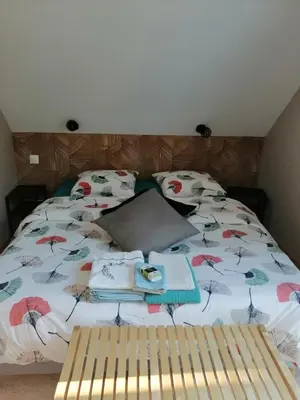 Un ou plusieurs lits dans un hébergement de l'établissement Natural green villa 15 personnes