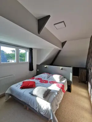 Un ou plusieurs lits dans un hébergement de l'établissement Natural green villa 15 personnes
