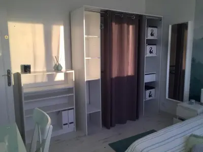 Un ou plusieurs lits dans un hébergement de l'établissement Cozy'Maisonnette 5Chb Brest Guip
