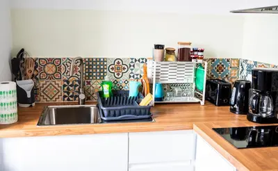 Cuisine ou kitchenette dans l'établissement T1 centre-ville refait à neuf