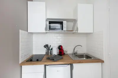 Cuisine ou kitchenette dans l'établissement En Distribil