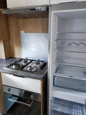 Cuisine ou kitchenette dans l'établissement Mobil home