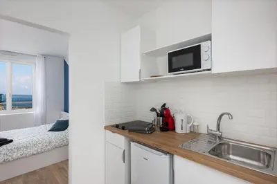 Cuisine ou kitchenette dans l'établissement Big aille