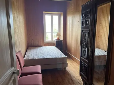 Un ou plusieurs lits dans un hébergement de l'établissement Grande Maison de Campagne proche de Carhaix