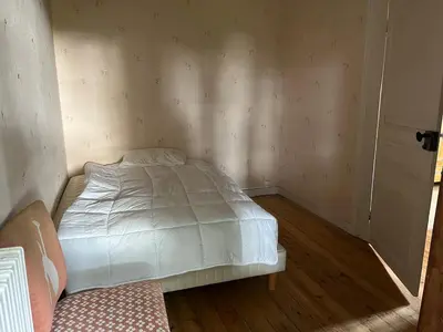 Un ou plusieurs lits dans un hébergement de l'établissement Grande Maison de Campagne proche de Carhaix